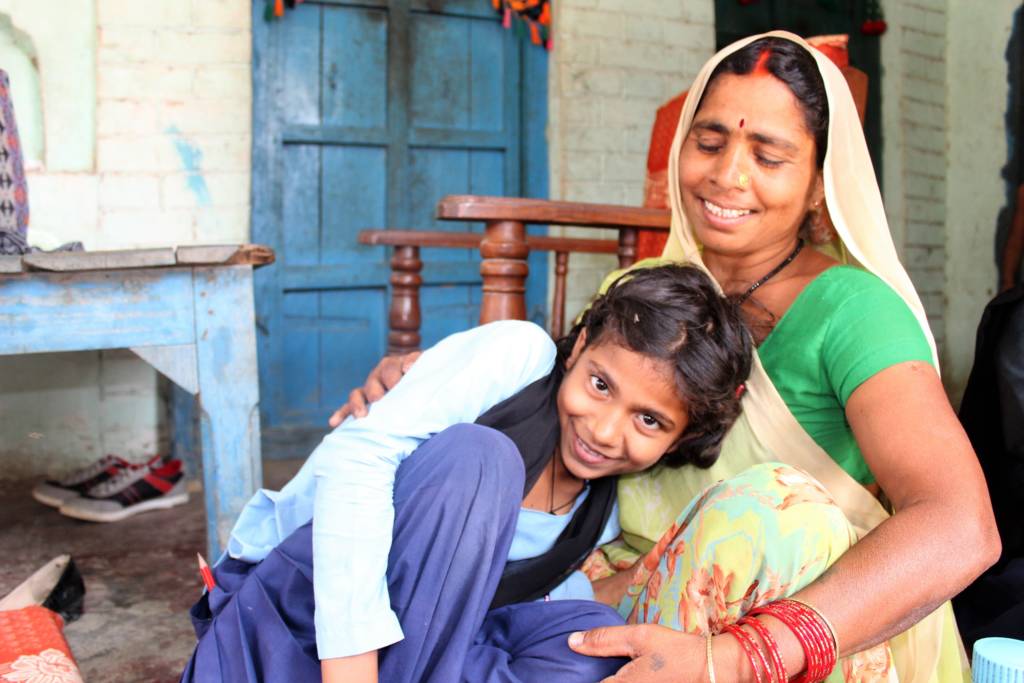 Kalpana and her mother Akali. She is one of the many girls who had dropped out of school early. However, after completing a year at  a Udaan Learning Center,  she now feels ready to join regular school.  Photo: Care Austria