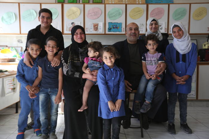 Walid and his family. Photo: OFID/Michael Zananiri and Yousef Hammad