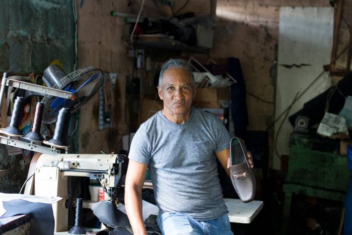 Jhonny Lopez is a shoemaker, whose Lopez Victoria brand is popular among neighbors in the Juan Pablo Duarte barrio in Santo Domingo, the capital of the Dominican Republic.